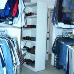 Shoe rack hiding a custom safe room