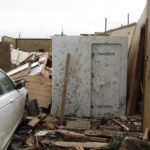 A battered but intact custom storm shelter