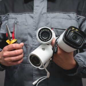 Man installing video surveillance