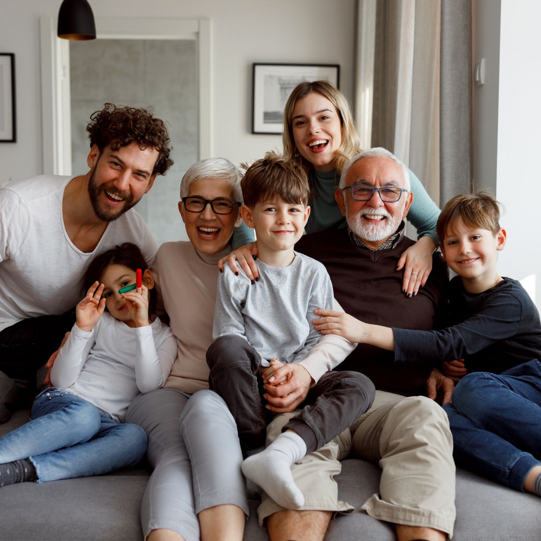 family sitting together on the couch