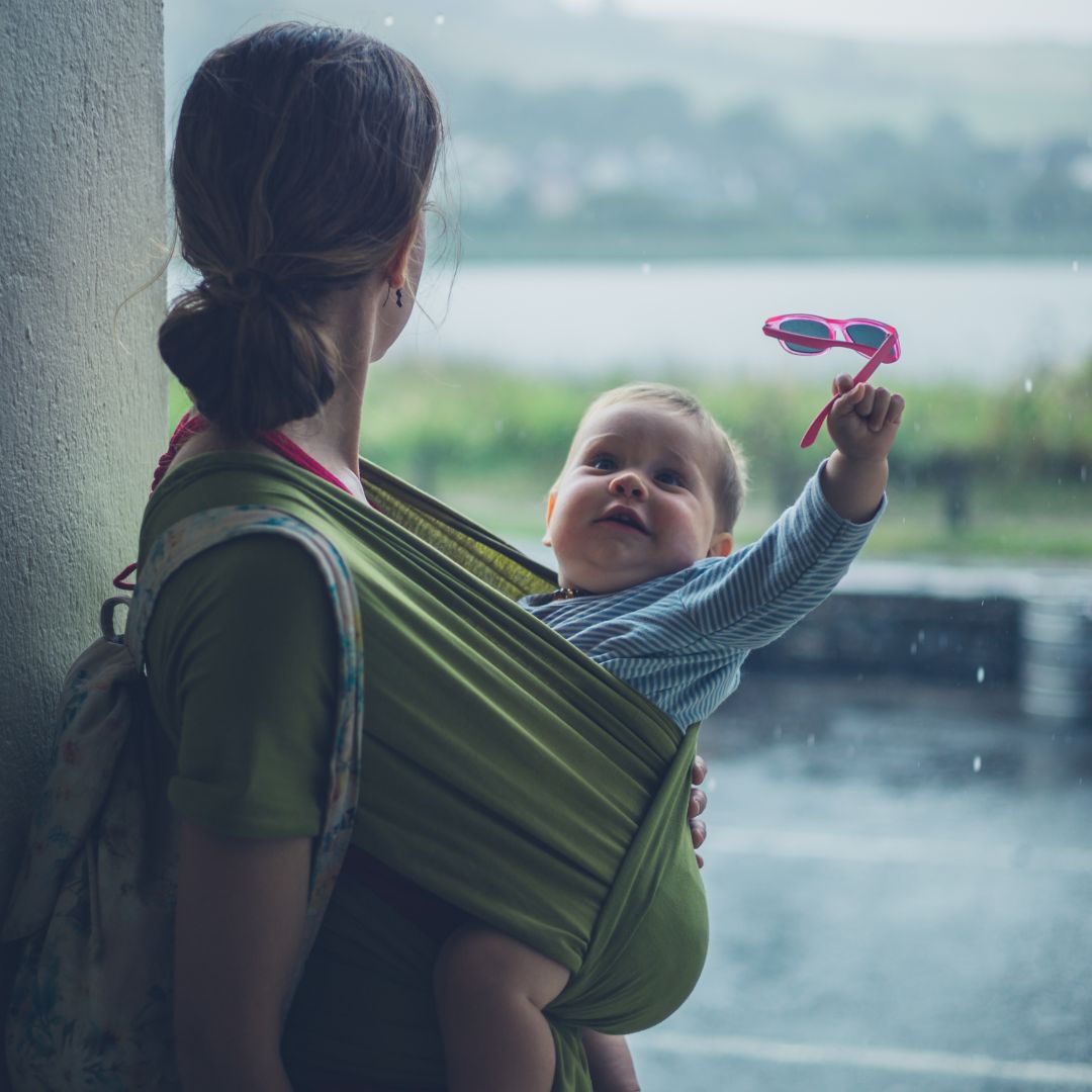 Mom and Child Looking out at the Rain
