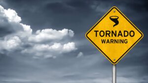 yellow tornado warning sign