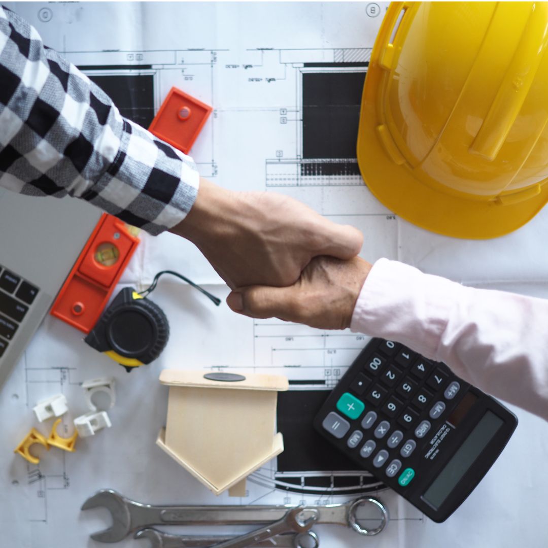 construction hat and handshake