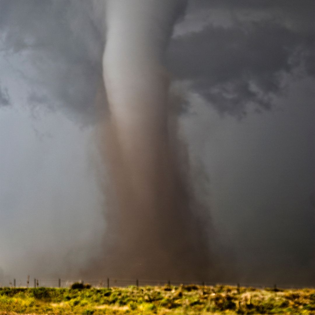 big tornado over neighborhood