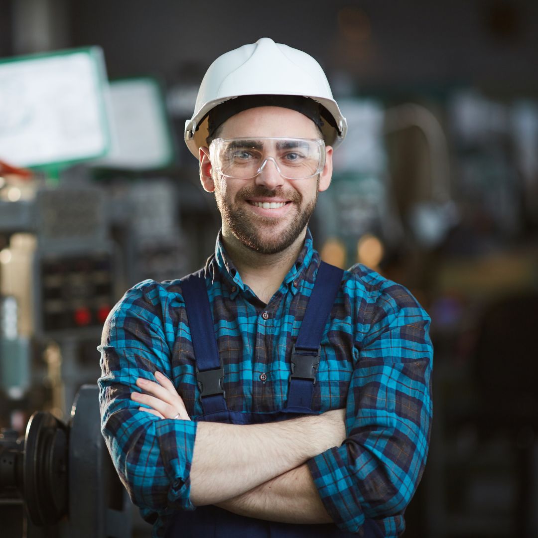 A worker smiling