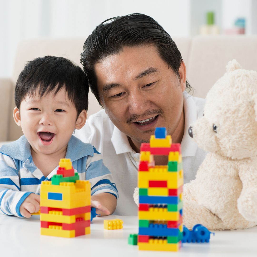 A dad playing with his child