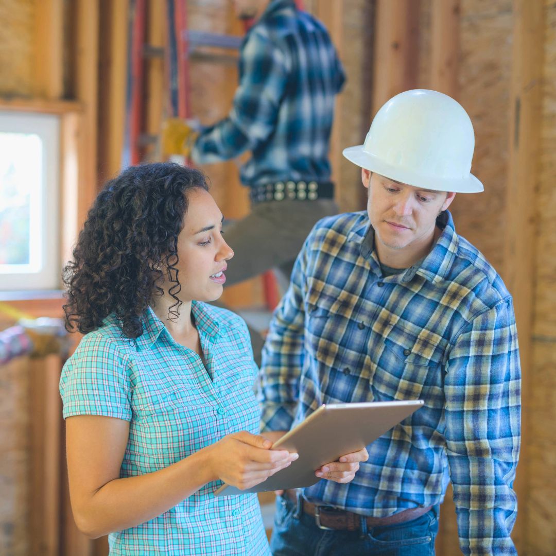 A homeowner speaking to a contractor