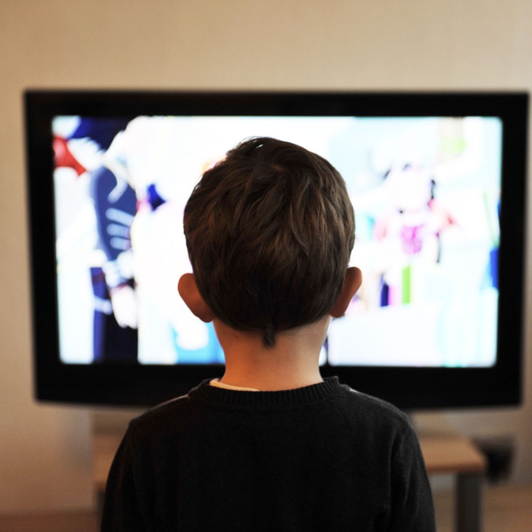A boy watching TV