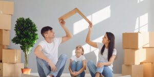 A family of three in their home