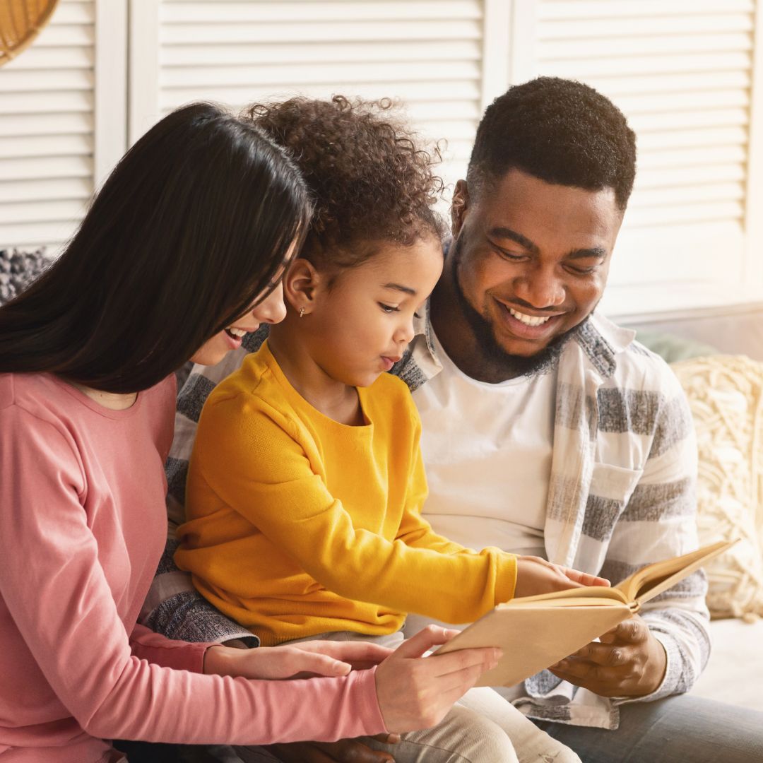 Parents reading with their child