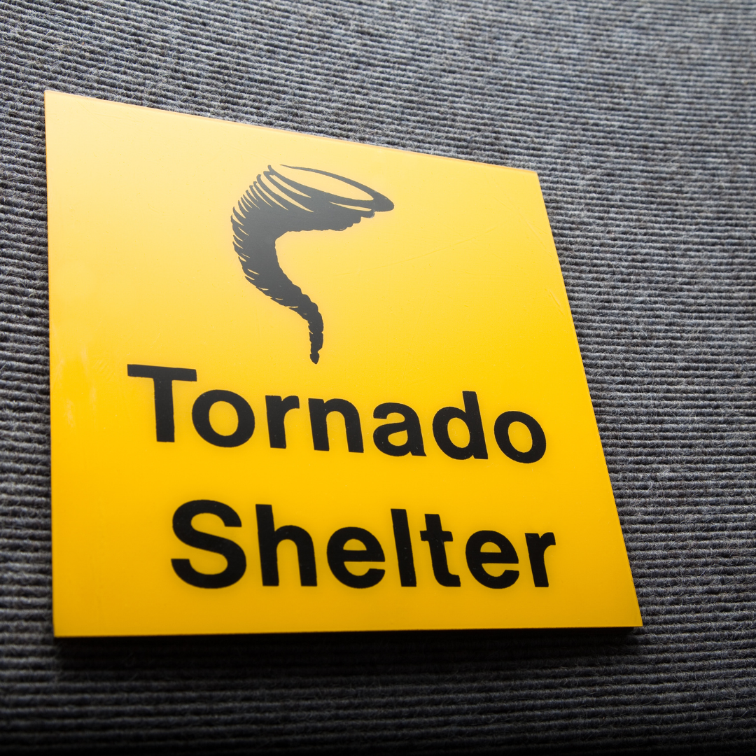 Tornado shelter sign.