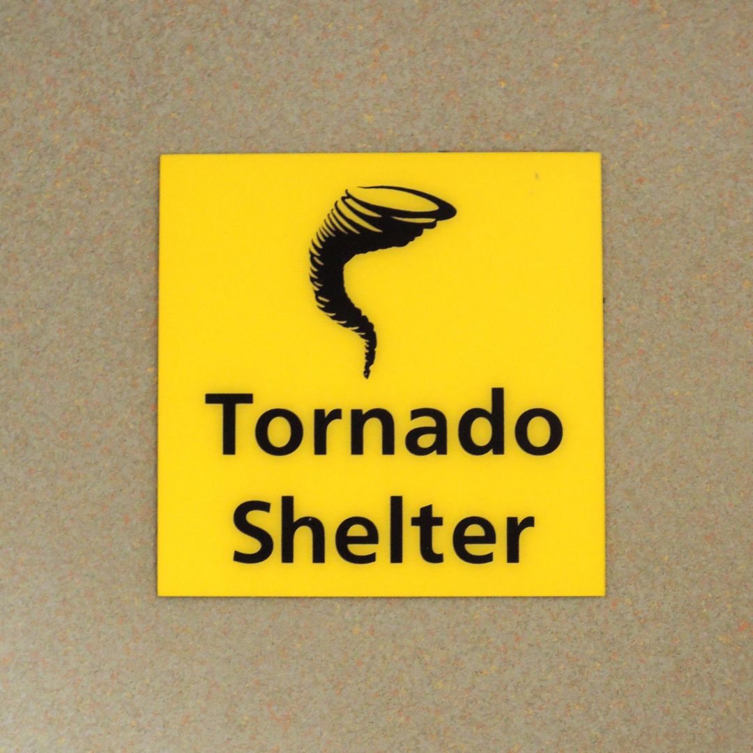 A tornado shelter sign