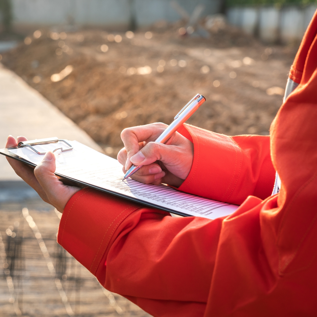 Inspector writing on notepad